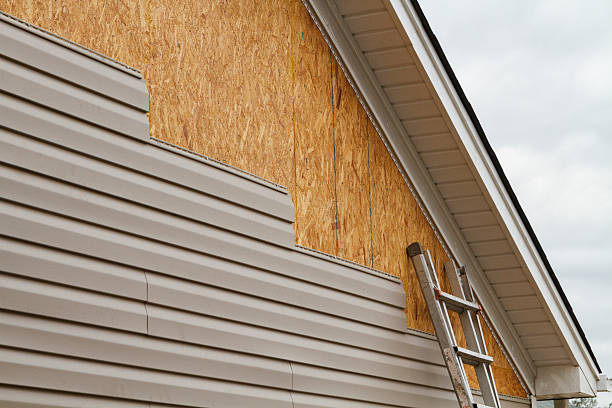 Professional Siding Replacement technician working in Sykesville, MD